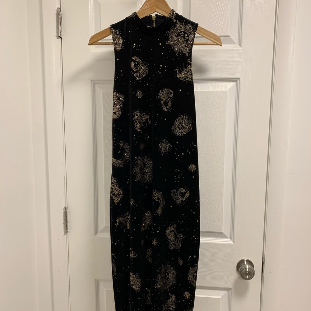 Backless, sleeveless velvet zodiac dress